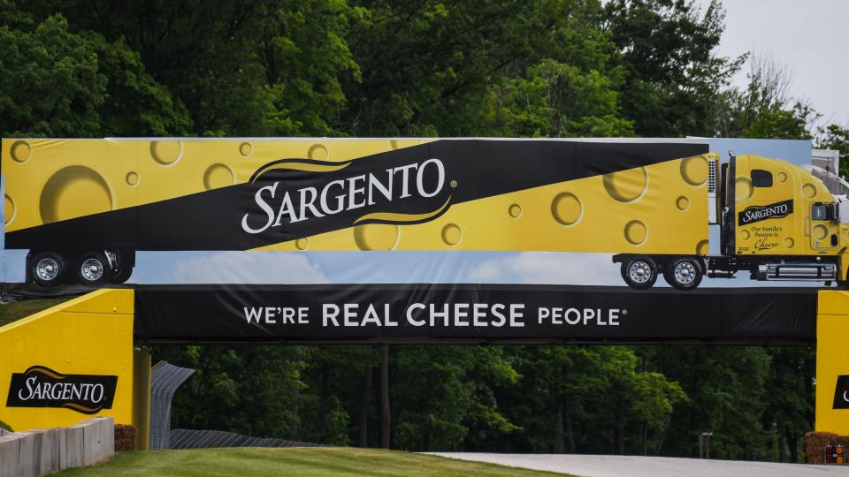 Sargento cheese advertisement banner on the race track